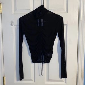 Sheer Turtleneck Top